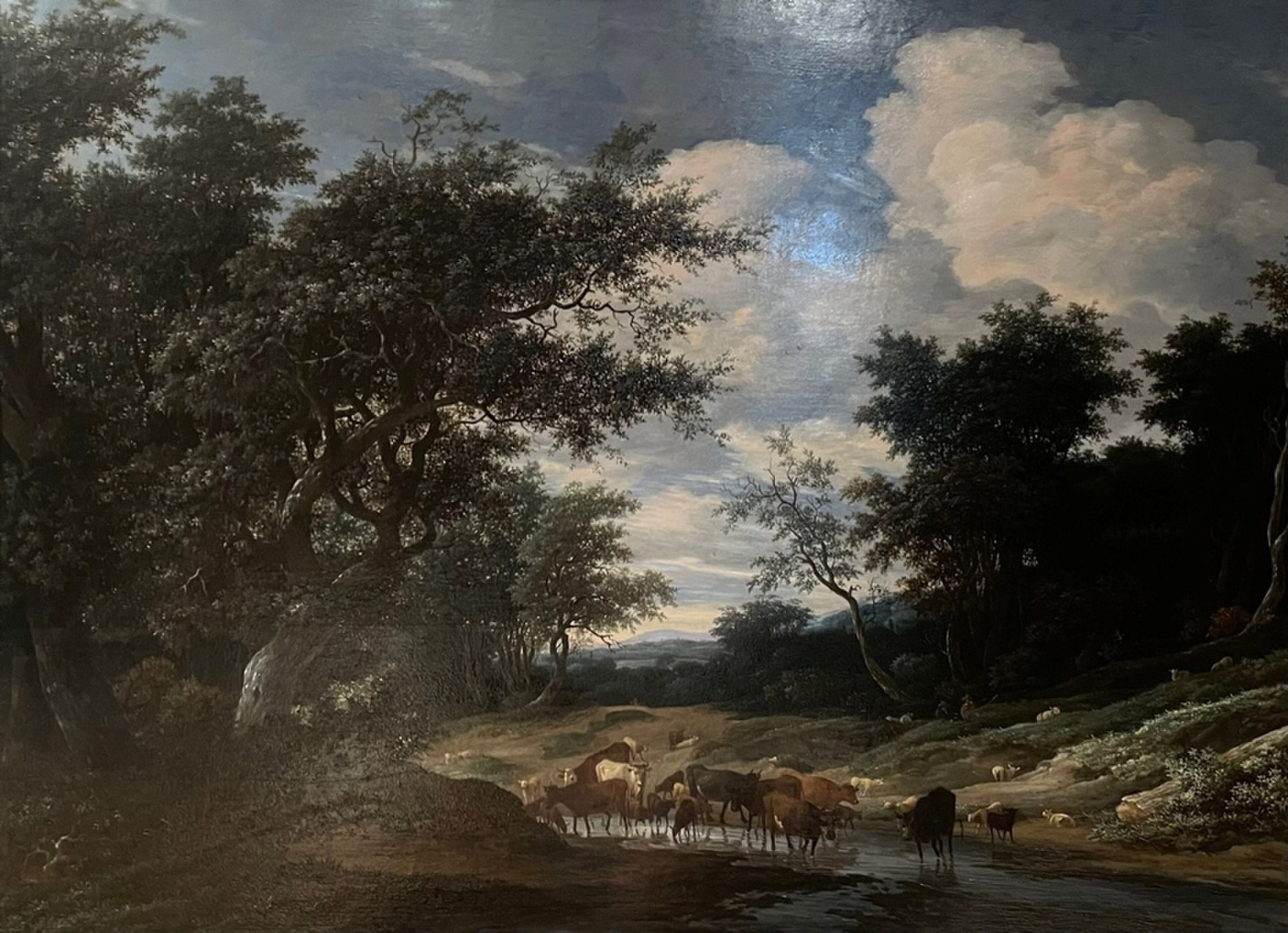 A Wooded River Landscape with Cattle by Jacob Salomonsz van Ruysdael