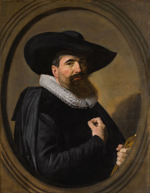 Portrait of a man with hat and ruff collar
