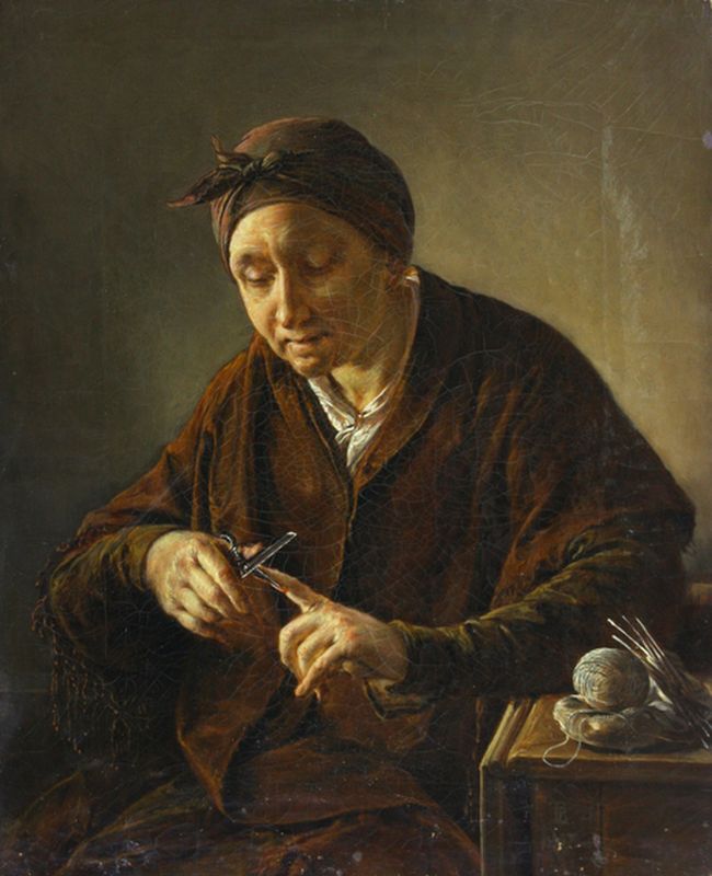 The woman cutting nails