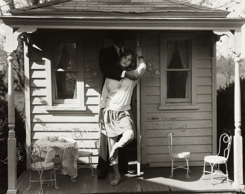 Julie, John, and Doll House, from the series "At Twelve" by Sally Mann